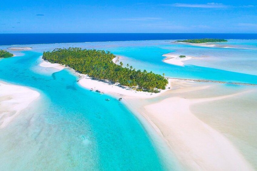A tropical island surrounded by turquoise waters. 5