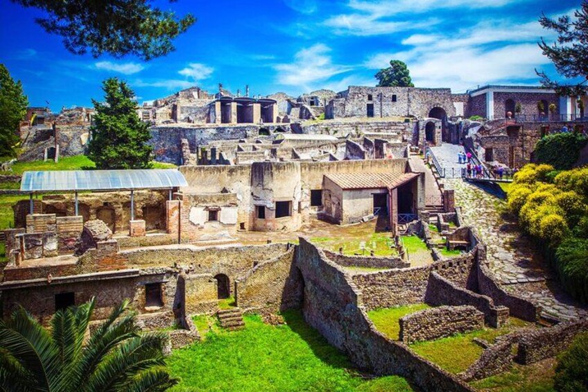 Ancient ruins with stone buildings and pathways. 5