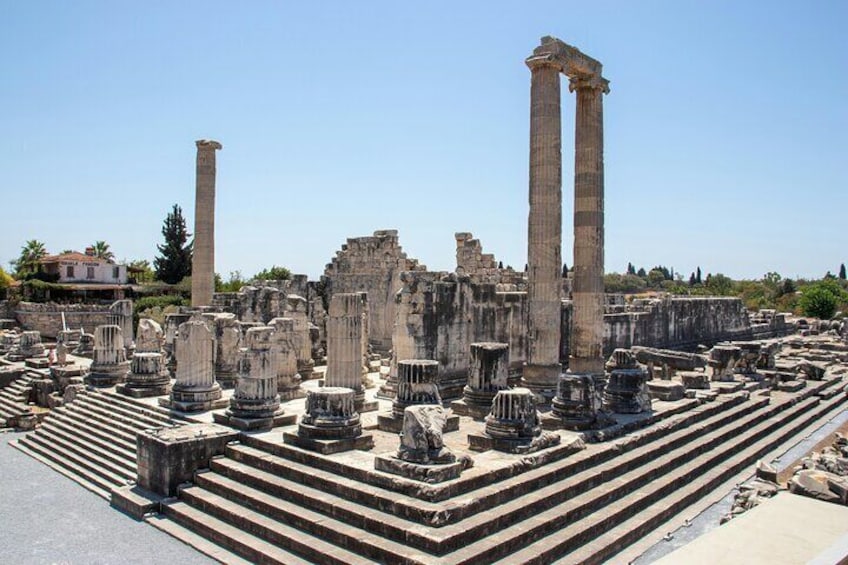 Ancient ruins with columns and steps. 4