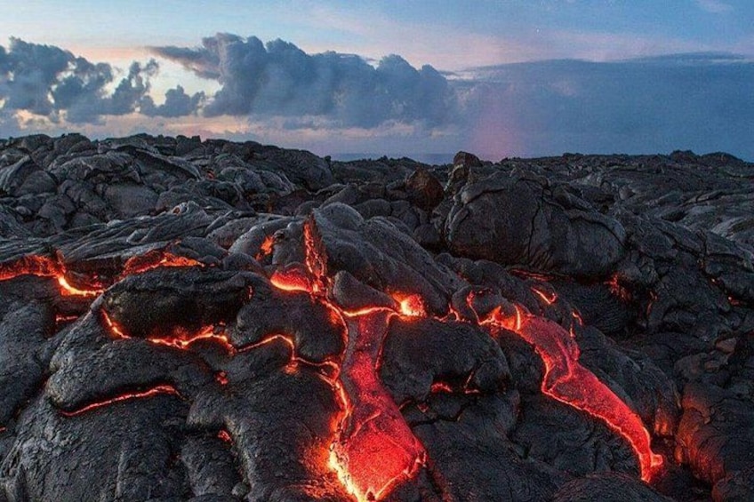 A volcanic landscape with flowing lava. 3
