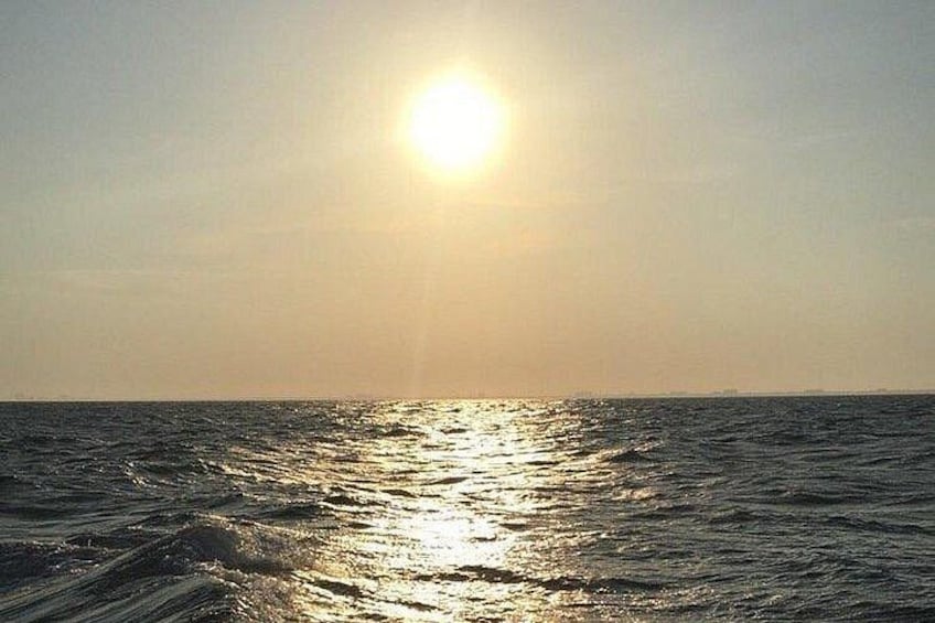 A sun reflecting on the ocean surface. 2