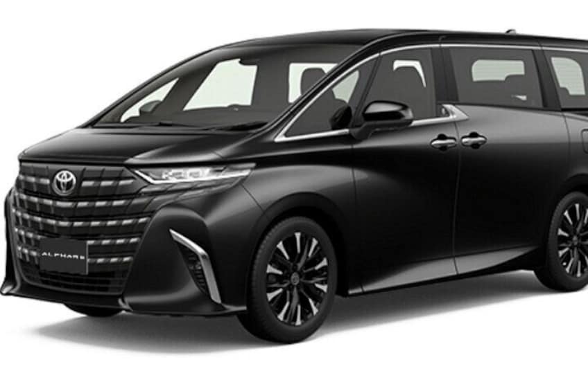 A black Toyota Alphard SUV with a sleek design, prominent front grille, and stylish alloy wheels. 2