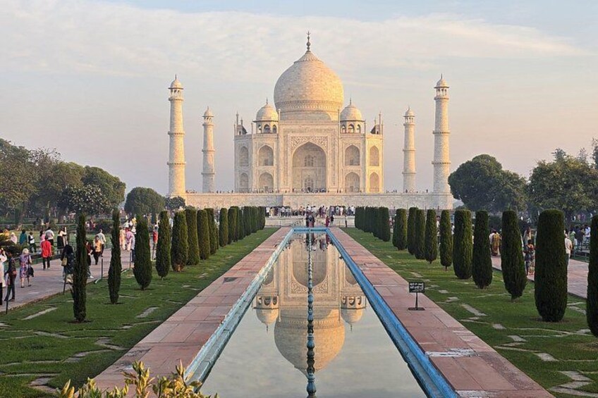 The Taj Mahal with a central reflecting pool and symmetrical gardens. 5