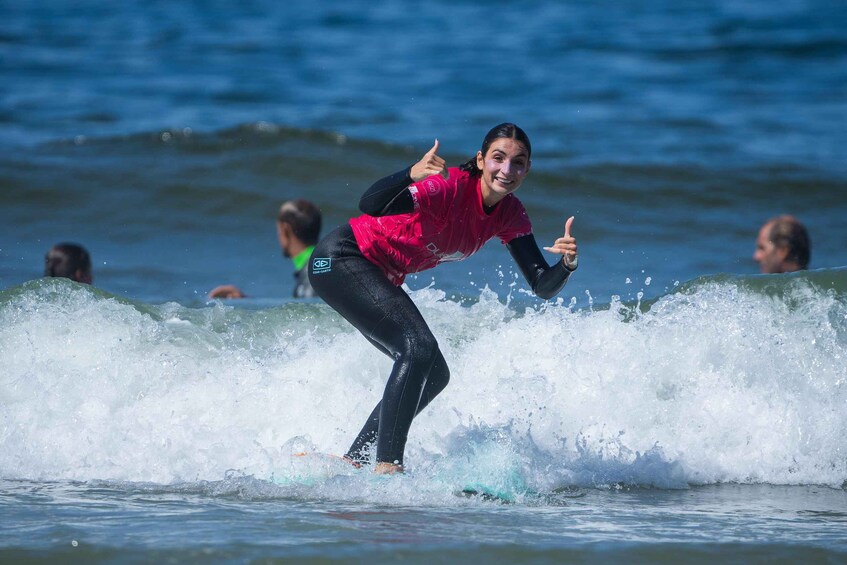 A person surfing on a wave. 3