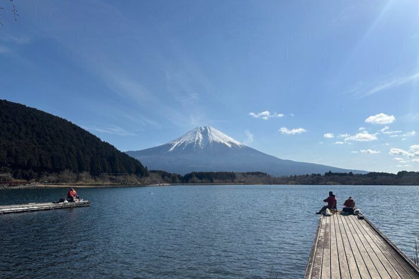 Beautiful panoramic view of Mt. Fuji across a calm lake. A perfect location to enjoy nature without tourist crowds. 5