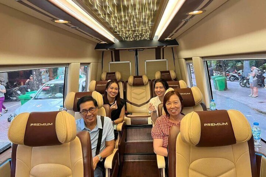 A train interior with premium seats and a modern design. 3