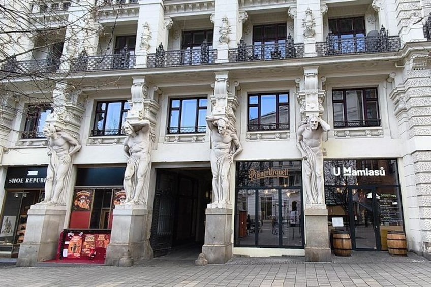 House at the Four Giants — a historic Brno townhouse named for the four sculpted figures that seem to support its balcony. 2