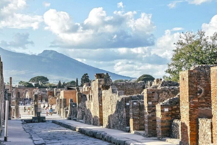 Ancient ruins with a mountain in the background. 3
