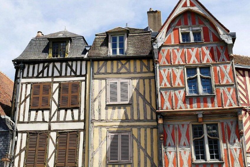 Medieval Architecture: The colourful facades and exposed beams of historic houses in the city centre. 4