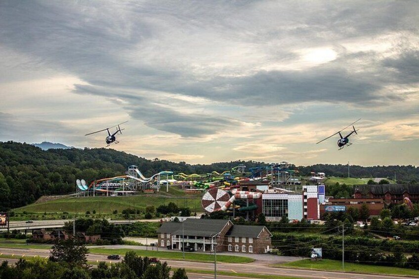 Multiple helicopters departing for tours over the Smoky Mountain region. 3