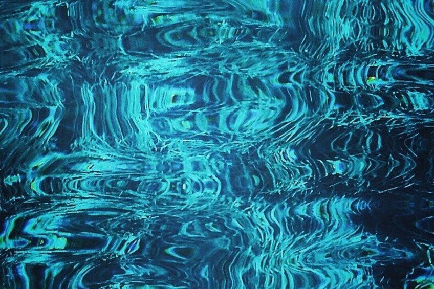 A textured surface with swirling patterns. 4