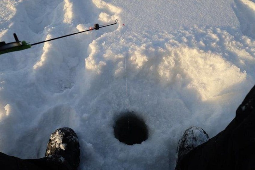 Ice Fishing and Winter BBQ Experience in Finnish Wilderness 5