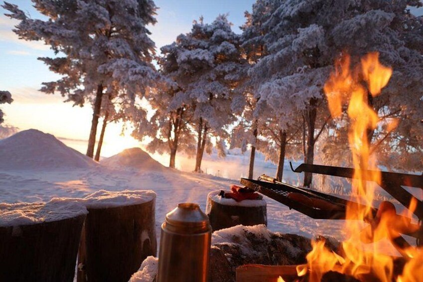 Ice Fishing and Winter BBQ Experience in Finnish Wilderness 1