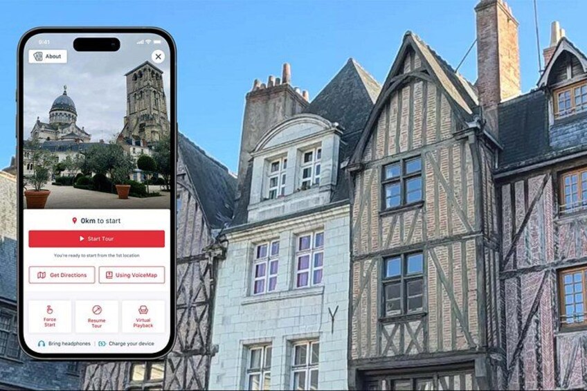 A smartphone displaying a tour app with a view of historic buildings. 1