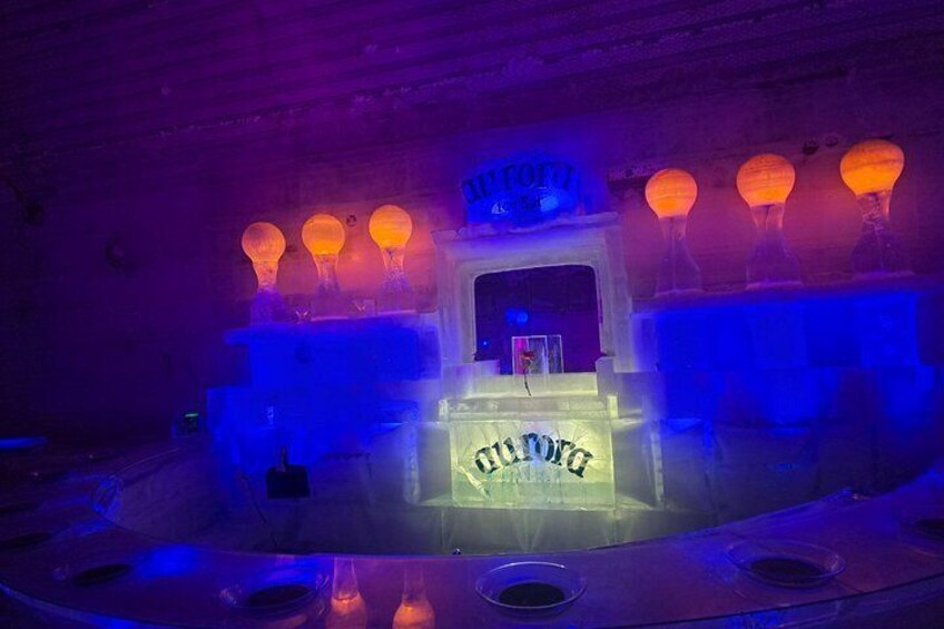 An ice sculpture with a sign that reads 'Madrid.' 2