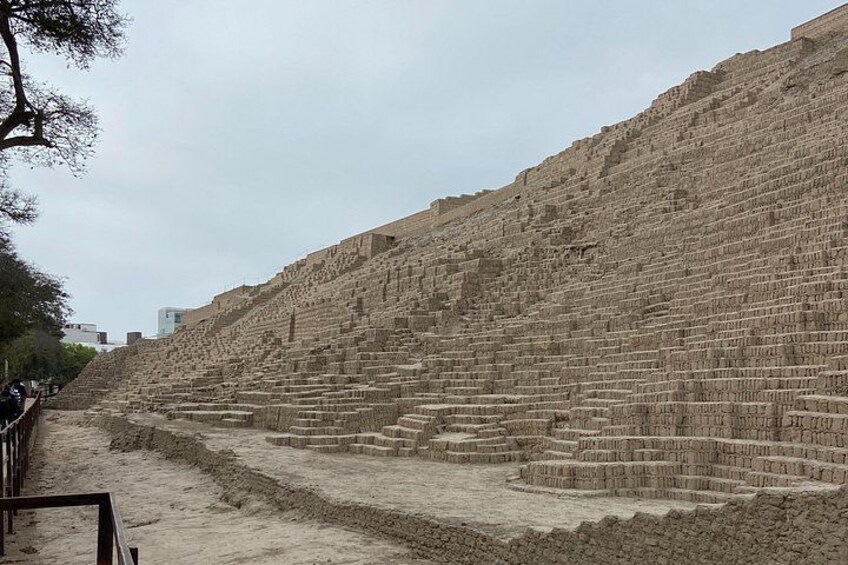 A terraced structure with multiple levels, likely a historical or archaeological site. 2