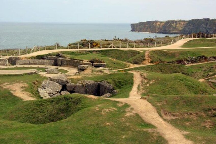 See the remains of a German bunker complex at Pointe du Hoc 2