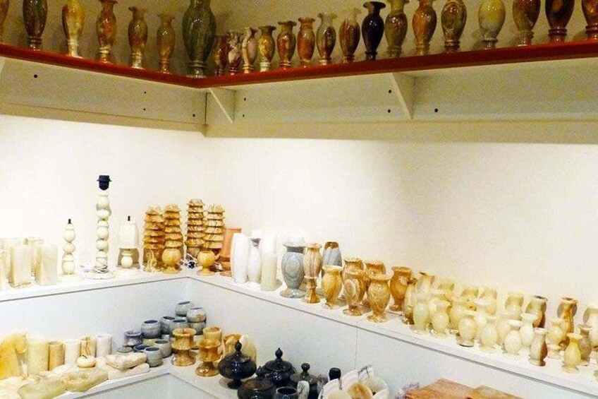 A display of various ceramic vases and containers. 5