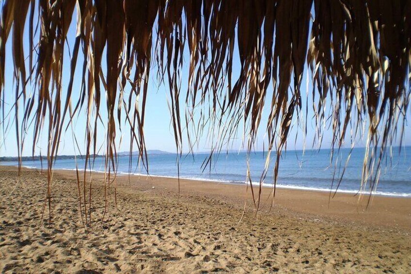 A beach with sand and ocean waves. 2