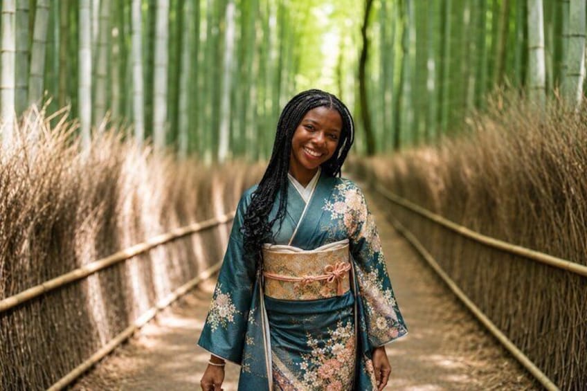 A person in a kimono walking on a bamboo path. 1