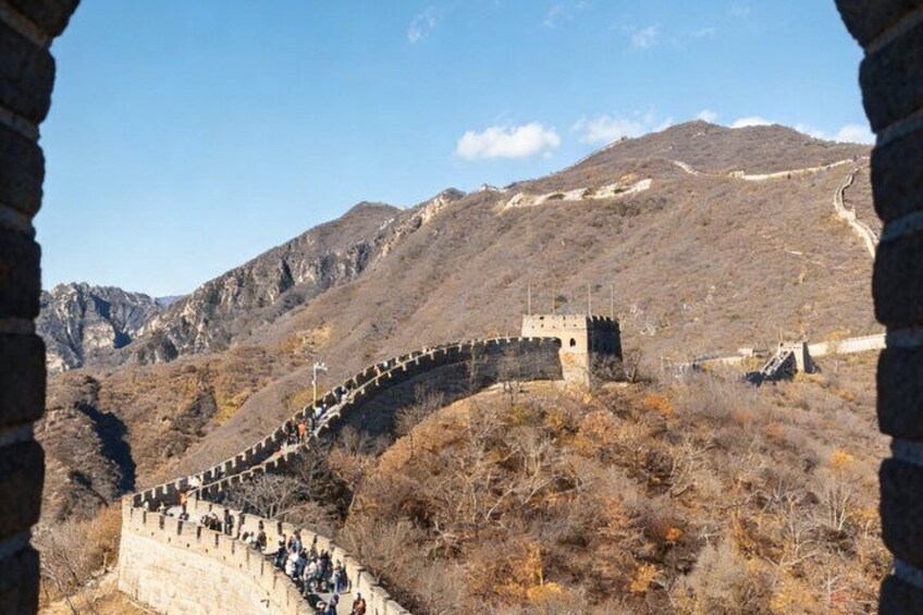 The Great Wall of China winding through a mountainous landscape. 1