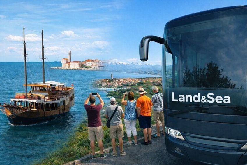 A coastal scene with a boat, a bus, and people observing the view. 1