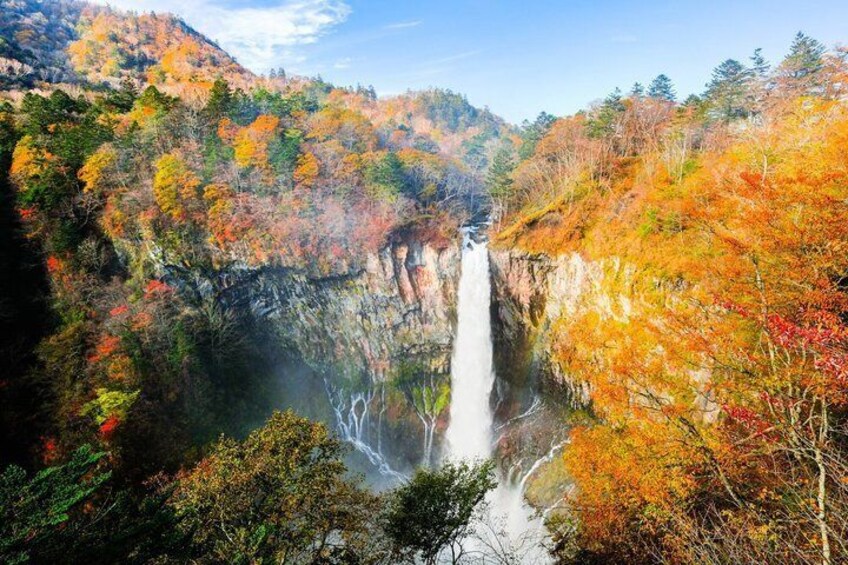Take in the breathtaking view of Kegon Falls framed by vibrant autumn colors in Nikko National Park. 3