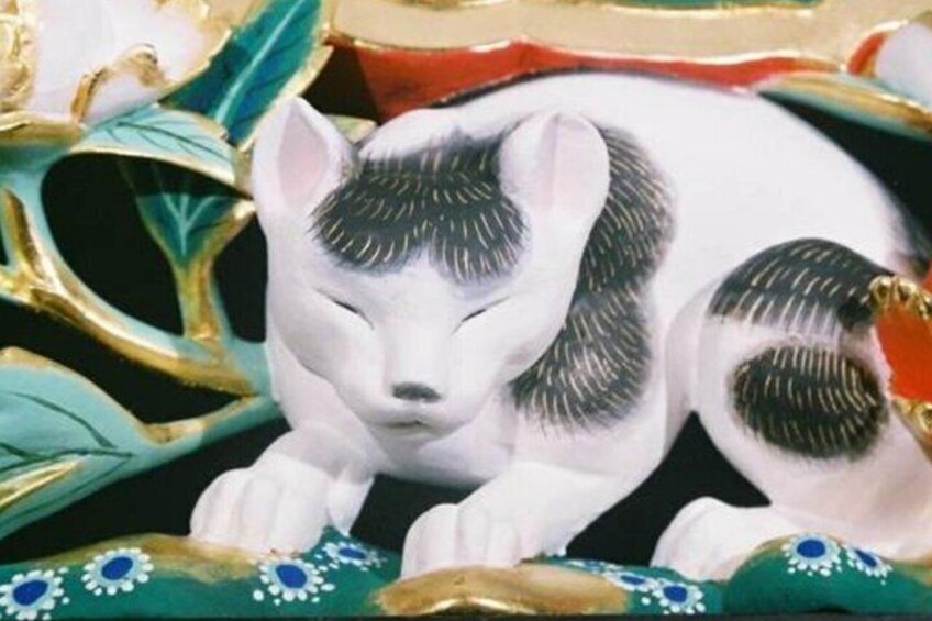 Spot the famous Sleeping Cat carving at Nikko Toshogu Shrine, symbolizing peace after conflict in Tokugawa Japan. 2