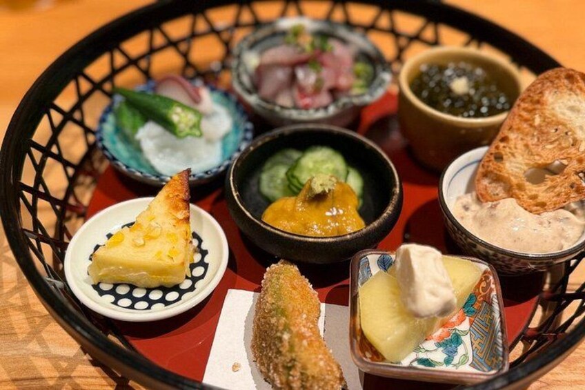 Experience a variety of small seasonal dishes, offering a delightful introduction to local Japanese flavors. 4