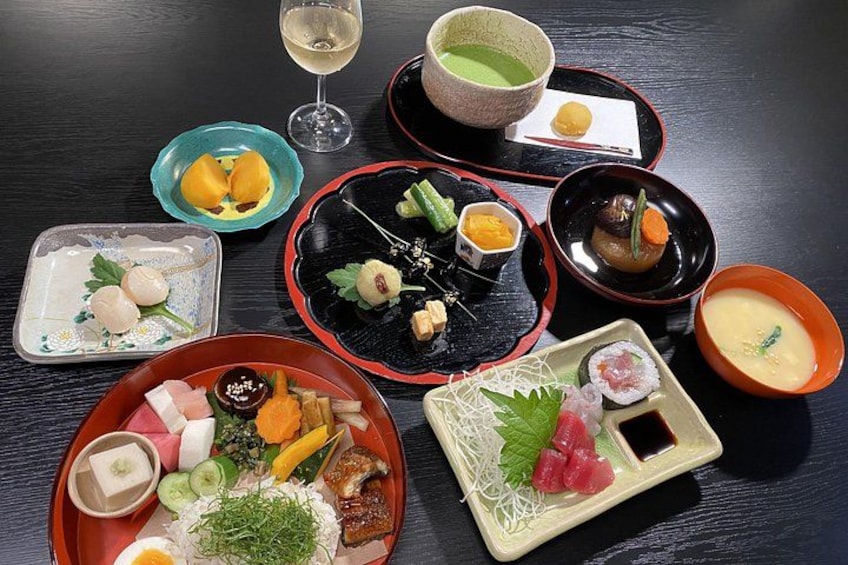 A variety of Japanese dishes arranged on a table. 3
