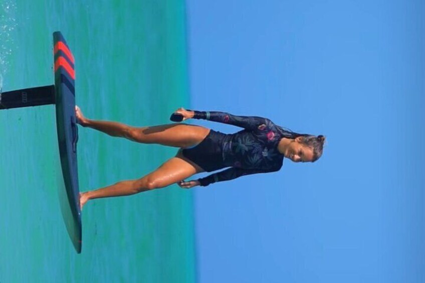 A person surfing on a board. 3