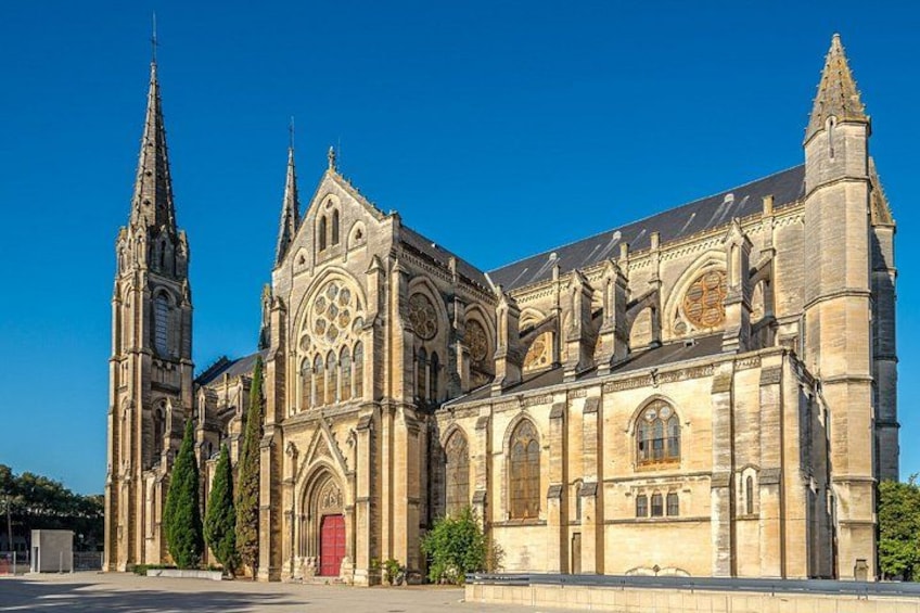 Saint-Baudile Church: The two slender arrows of this neo-Gothic building, erected opposite the ancient Gate of Augustus. 2
