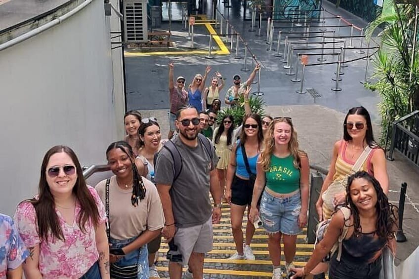 A group of people walking on a staircase. 3