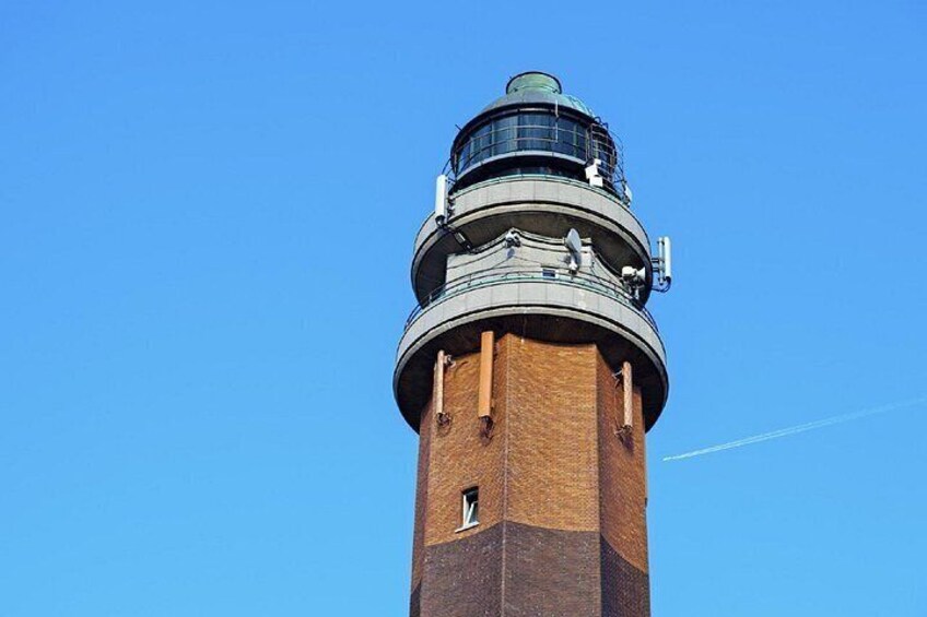 Phare de la Canche: The octagonal red brick tower, designed by architect Louis Quételart, overlooking the entire Côte d'Opale. 2