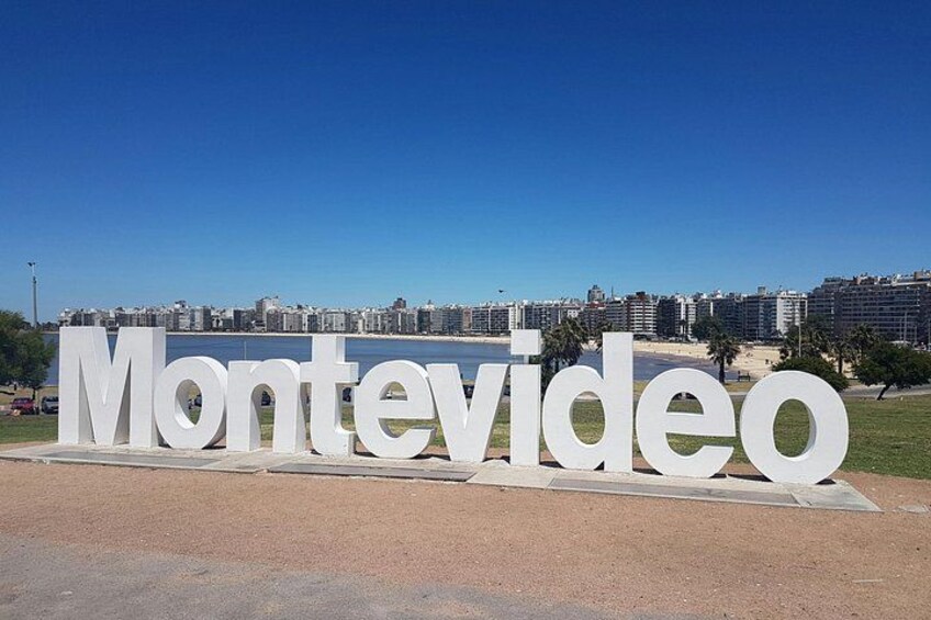 Large white letters spelling 'Montevideo' on a clear day. 2