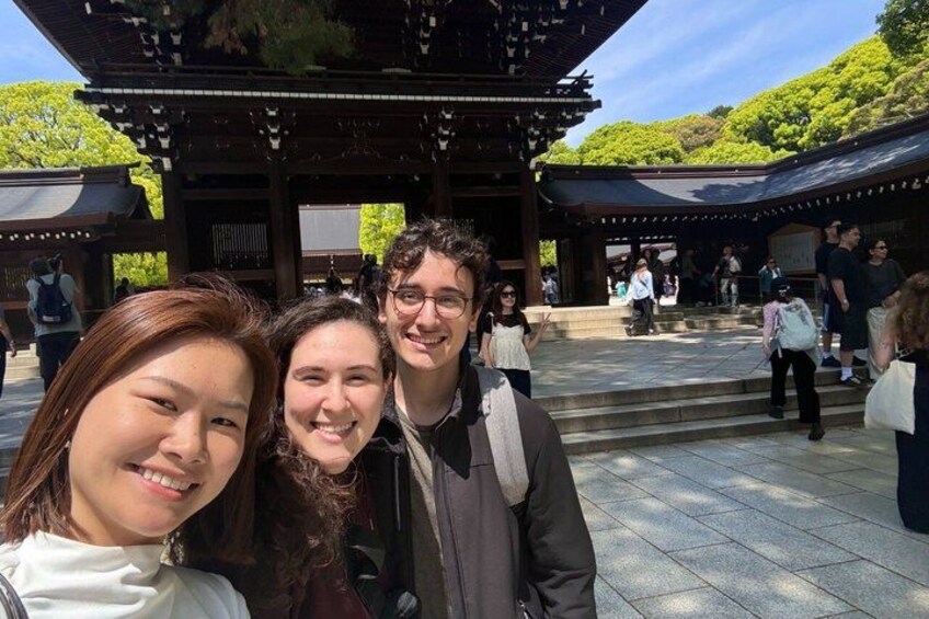 A traditional Japanese gate with visitors in the background. 3