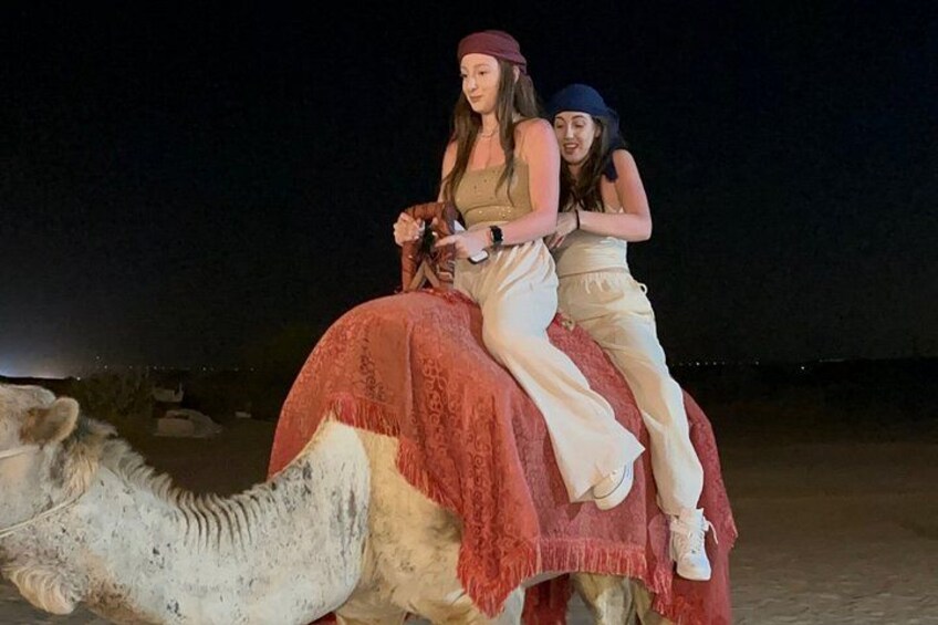 Dubai desert Safari with quad ATV bike BBQ dinner VIP camp Shows 4