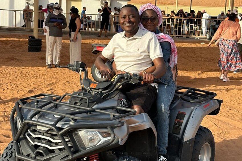 Dubai desert Safari with quad ATV bike BBQ dinner VIP camp Shows 3