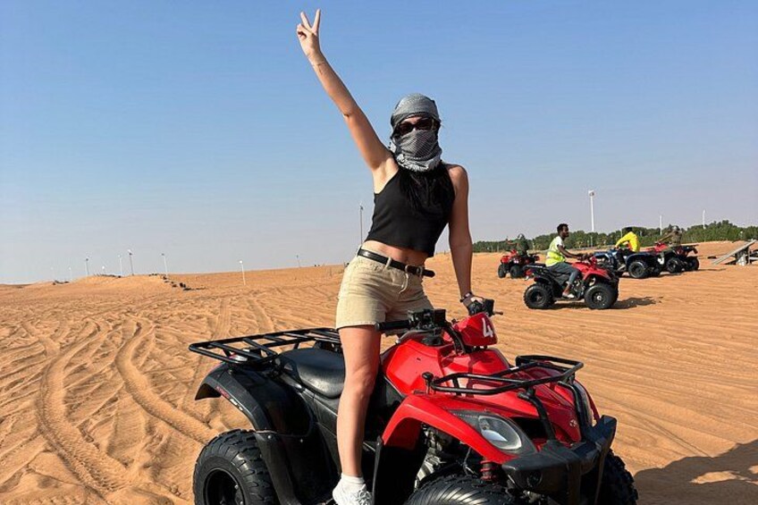 Dubai desert Safari with quad ATV bike BBQ dinner VIP camp Shows 1