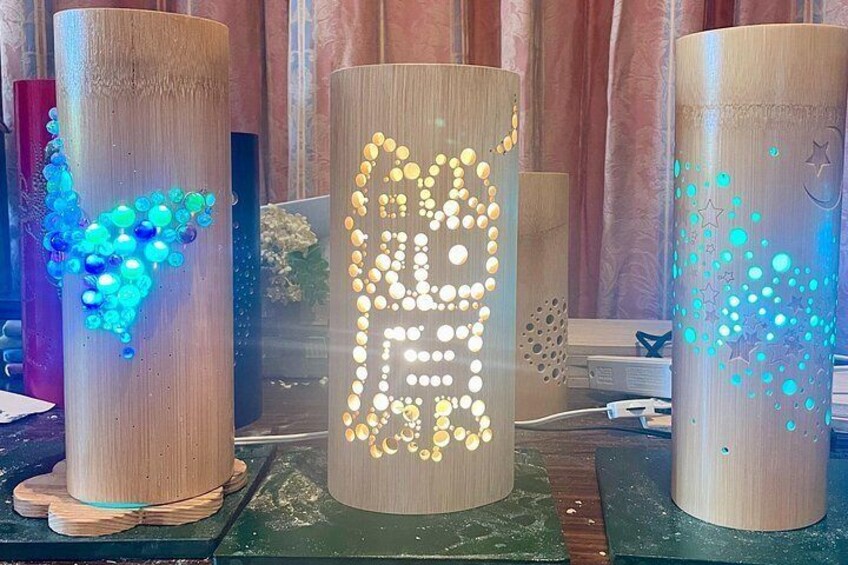 Three cylindrical objects with LED lights, each displaying different patterns. 2