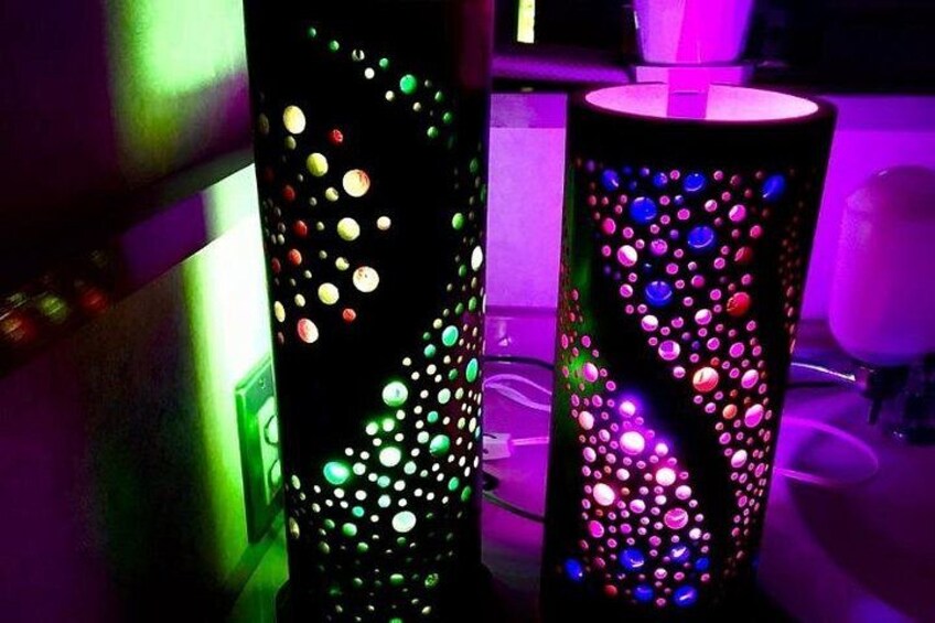 Two cylindrical objects with colorful lights. 2