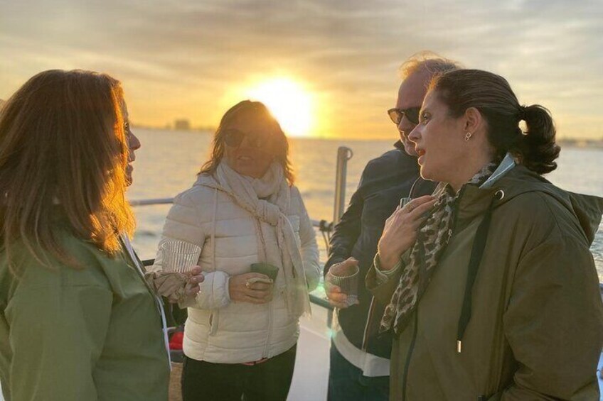 People on a boat during sunset. 3