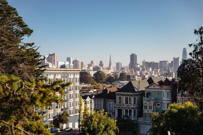 A cityscape with historic buildings and modern skyscrapers. 2