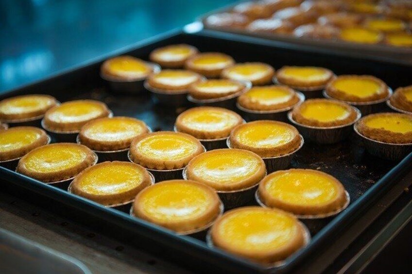 A tray of custard tarts. 3