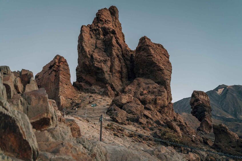 A rugged rock formation with a clear sky. 4