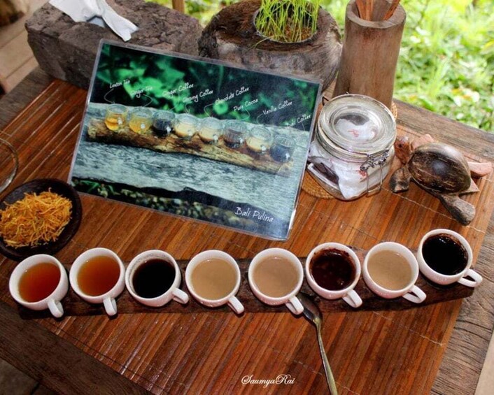 A wooden table with a menu, a jar of sugar, and several cups of coffee. 4