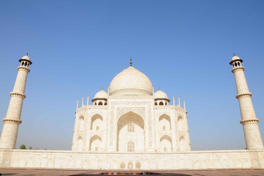 The Taj Mahal with four minarets and a large central dome. 1