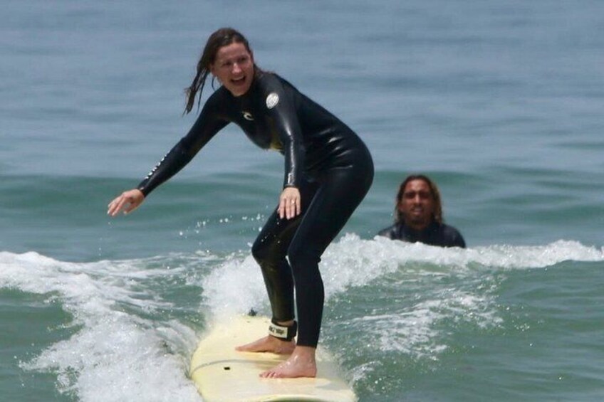 A person surfing on a wave in the ocean. 2