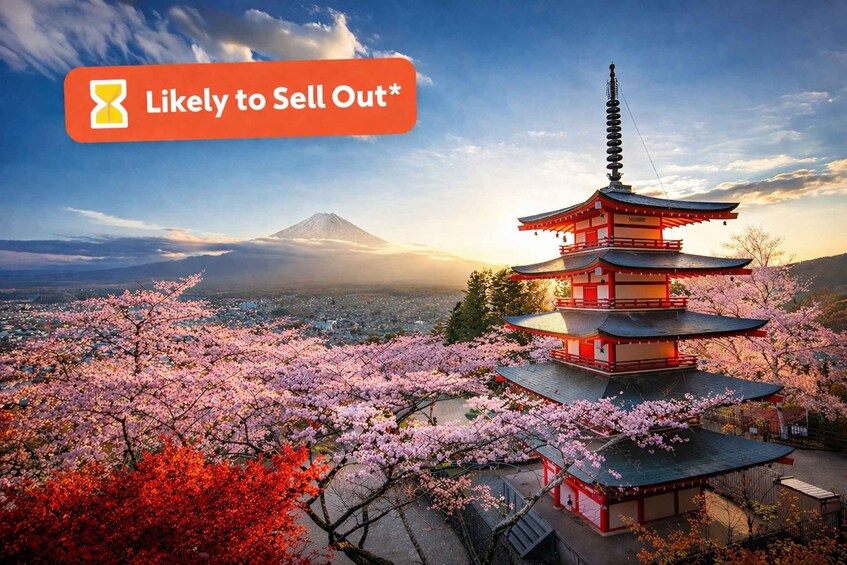 A pagoda surrounded by cherry blossoms with Mount Fuji in the background. 3