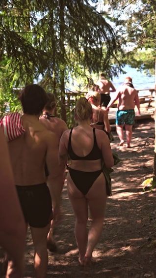 People walking on a forest path. 1